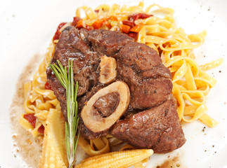 tasty steak with pasta