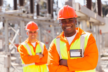 young african american electrical engineer in substation