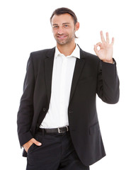 Young business man showing OK sign