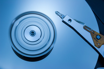Close up of modern opened hard disk drive.