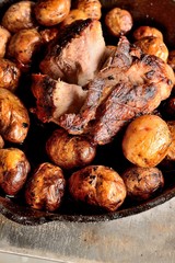 whole fried potatoes with meat