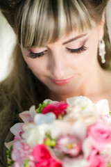 portrait of a beautiful bride with a bouquet of flowers