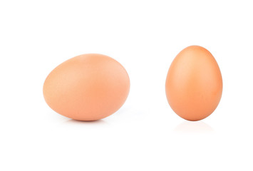 Single brown chicken egg isolated on white