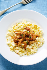 scrambled eggs with fried chanterelles