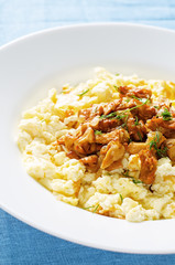 scrambled eggs with fried chanterelles
