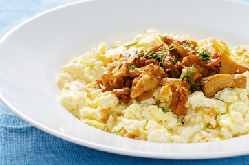 scrambled eggs with fried chanterelles