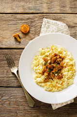 scrambled eggs with fried chanterelles