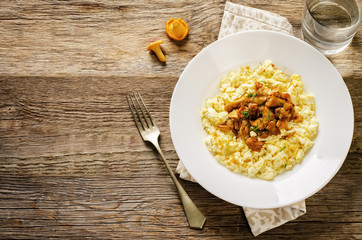 scrambled eggs with fried chanterelles