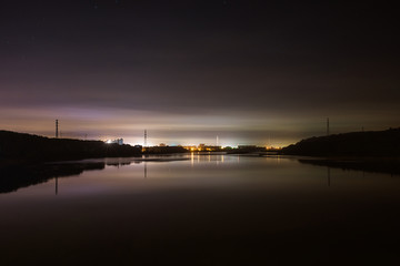 Fototapeta na wymiar Night city lights over the lake