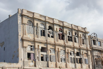 Fototapeta na wymiar Ruined building on the Havana Malecon