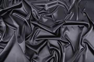 Expensive black silk background.