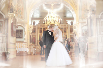 bride and groom get married in church