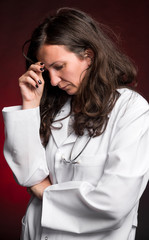 Portrait of sad female doctor