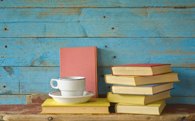Fototapeta na wymiar books and a cup of coffee, free copy space