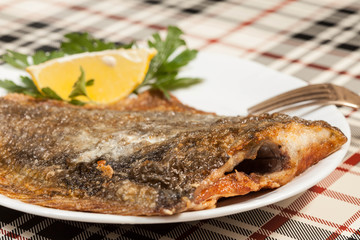 Fried flounder. Selective focus.