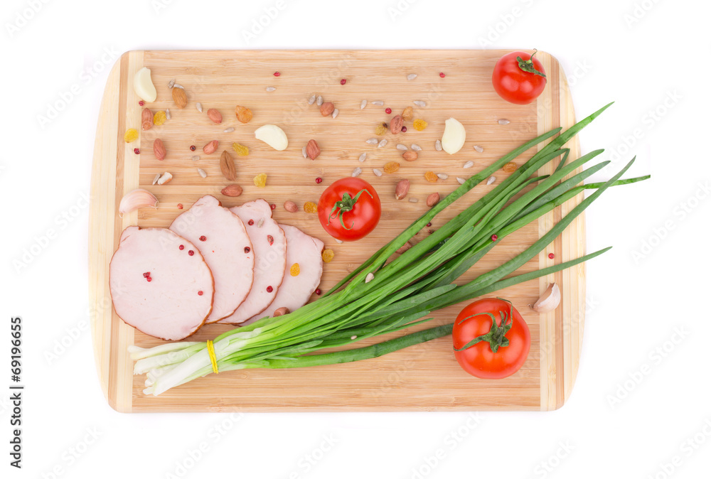 Canvas Prints Fresh vegetables and ham on cutting board.