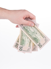 Hand holding american dollars.