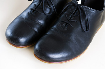 Black male leather shoes on white background