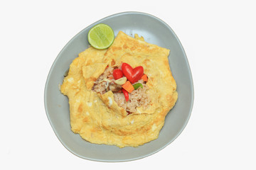 flavored fried rice in an omelet wrapping
