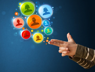 Social media icons coming out of gun shaped hand