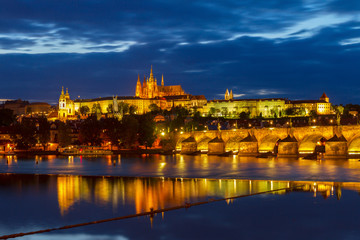 skyline of Prague with Vitus cathedral and Charles bridge
