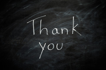Thank you written on a blackboard
