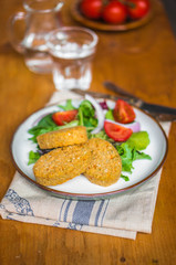 Chicken nuggets with salad