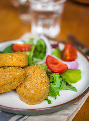Chicken nuggets with salad