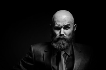 Fototapeta premium bearded in a suit and tie, businessman