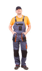 Happy worker wearing overalls.