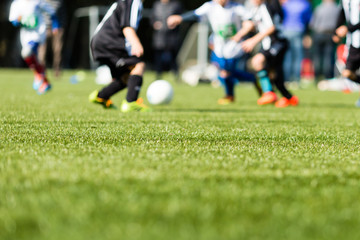 Naklejka premium Kids soccer blur