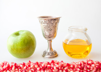 Rosh hashana Kiddush cup honey pomegranate and apple