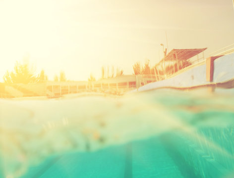 Instagram Style Image Half Underwater In Swimming Pool