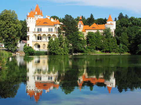 Chateau mirroring in a lake. Zinkovy, Czech republic.