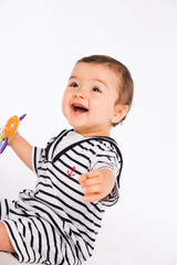 isolated studio portrait lovely toddler baby boy playing