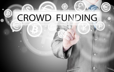Businessman pushes virtual crowd funding button