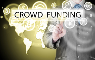 Businessman pushes virtual crowd funding button