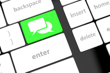 Social media key with two speech bubble sign on the keyboard