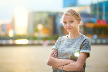 Girl walking at La Defense in Paris