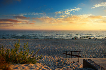 Fototapeta na wymiar Picturesque sunset on a sandy beach