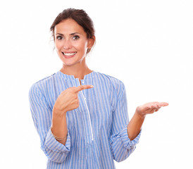 Adult woman pointing to her left hand