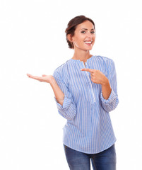 Pretty woman holding her right palm up