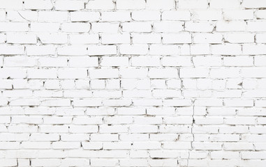 Old brick wall with white bricks