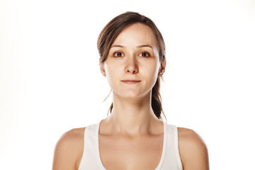 portrait of a serious young woman without make-up