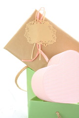 Gift and and paper bag on white background