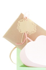 Gift and and paper bag on white background