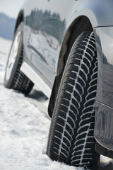 Winter tyres wheels installed on suv car outdoors