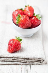 fresh strawberries on a white wooden table