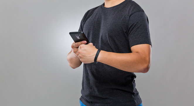 Man use mobile phone sync with wearble device