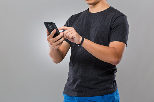 Man with smart device and use of mobile phone
